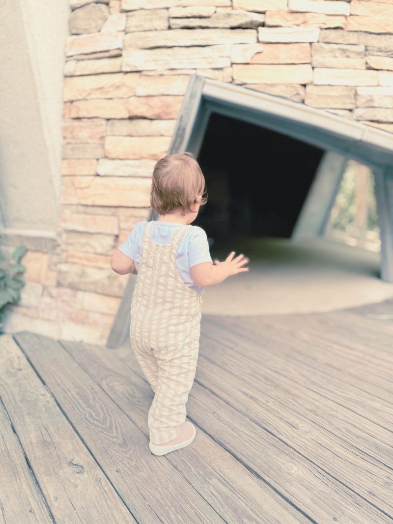 18-month-old toddler playing and communicating during everyday activities